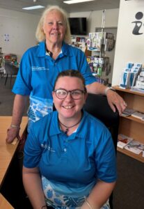 Two Townsville Community Information Centre volunteers