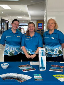 Three Townsville Community Information Centre volunteers