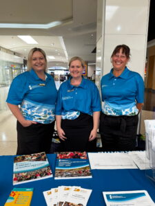 Three Townsville Community Information Centre volunteers
